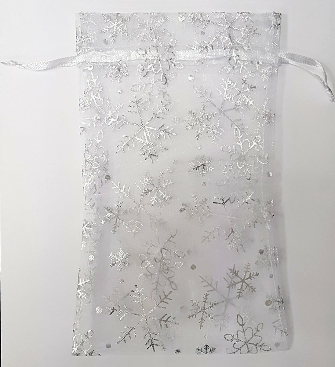 Organzabeutel transparent mit silbernen Schneeflocken und Weihnachtsmotiven.jpg